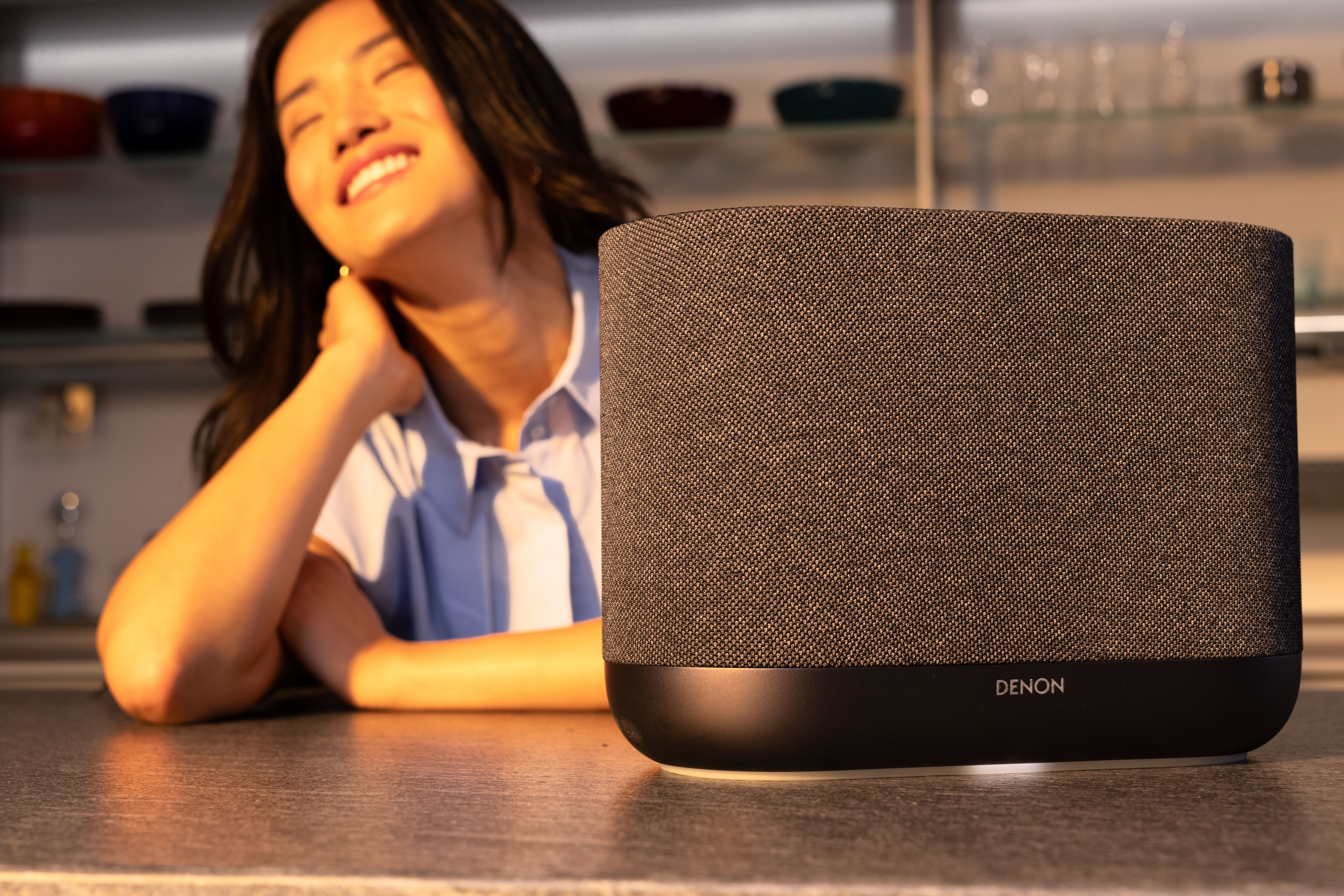 Denon Home 400 wireless speaker on a kitchen countertop